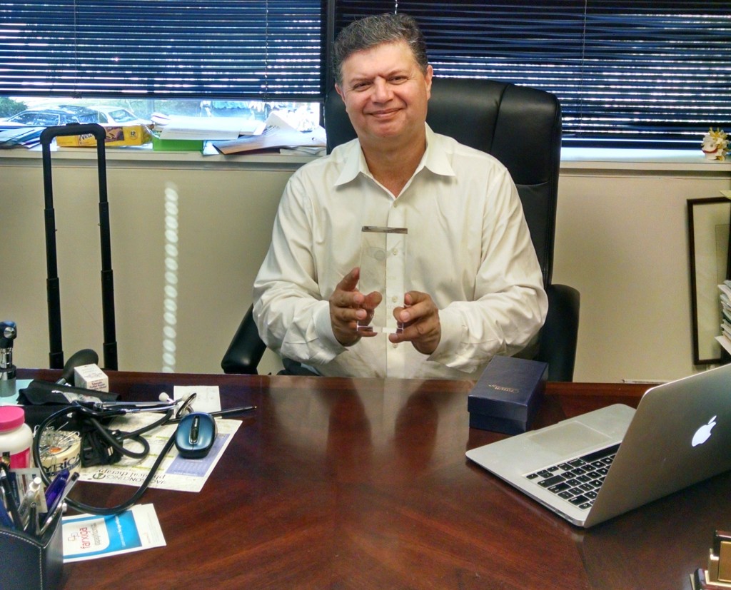 Mubarik Posing in his Office